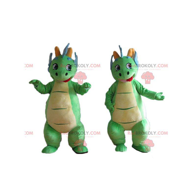 2 niedliche und bunte grüne und blaue Dinosauriermaskottchen -