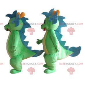 2 niedliche und bunte grüne und blaue Dinosauriermaskottchen -