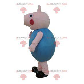 2 pig mascots one in red dress the other in blue -