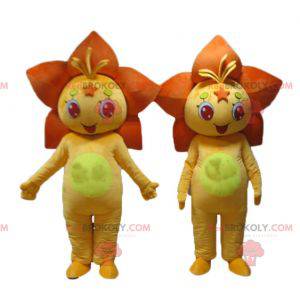 2 mascotas de flores naranjas y lirios amarillos -