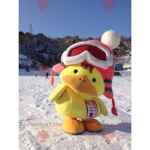 Stor gul och orange fågelunge för maskot med en vinterlock -