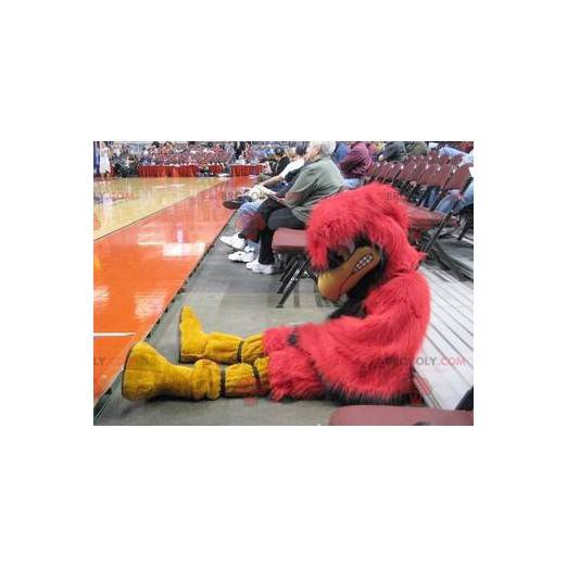 Mascotte grande uccello rosso e giallo che sembra brutto -