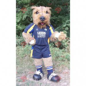 Mascote cachorro marrom todo peludo em roupas esportivas -