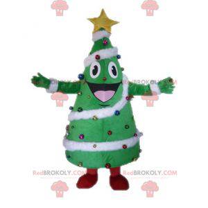 Riesiges und lächelndes geschmücktes Weihnachtsbaummaskottchen