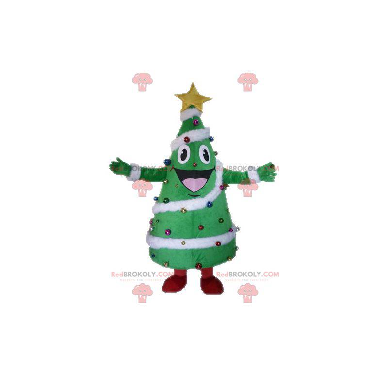Riesiges und lächelndes geschmücktes Weihnachtsbaummaskottchen Riesiges und lächelndes geschmücktes Weihnachtsbaummaskottchen