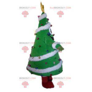 Riesiges und lächelndes geschmücktes Weihnachtsbaummaskottchen