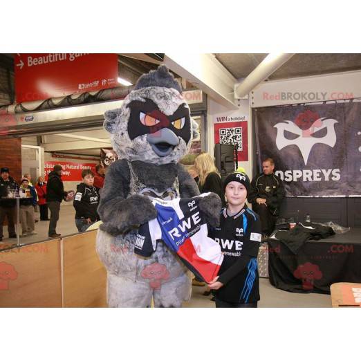Riesiges graues und schwarzes Vogelmaskottchen mit