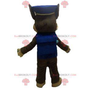 Mascota perro marrón en uniforme de policía - Redbrokoly.com