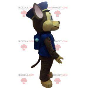 Mascotte de chien marron en uniforme de policier -