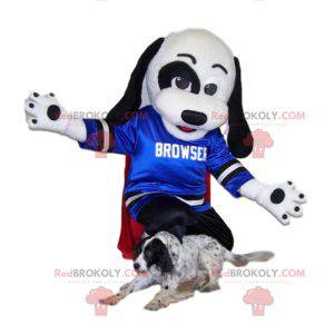 Mascotte de chien noir et blanc avec son maillot bleu de