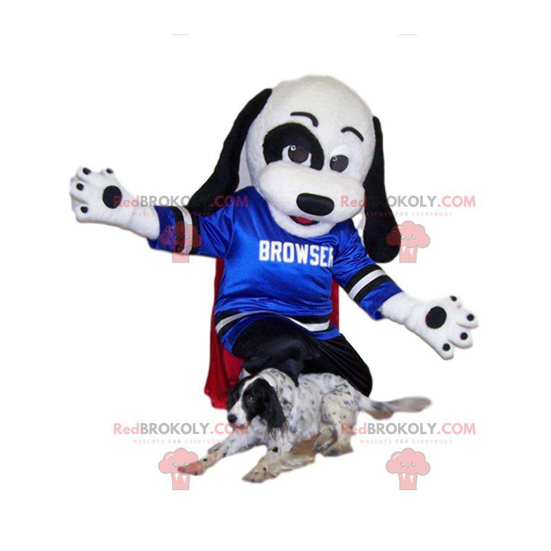 Mascotte cane bianco e nero con la sua maglia blu per sostenere