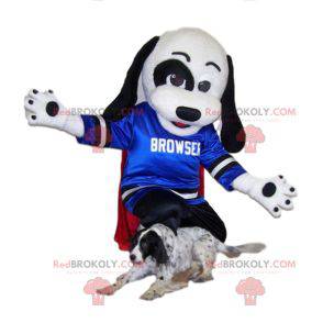 Czarno-biała maskotka psa z niebieską koszulką do wsparcia -