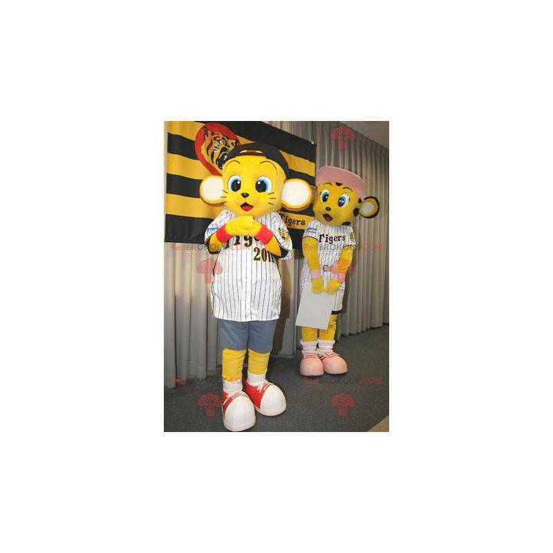 2 maskoti malých žlutých tygrů ve sportovním oblečení -