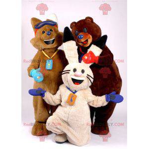 3 maskotar en brun räv, en vit kanin och en brun björn -