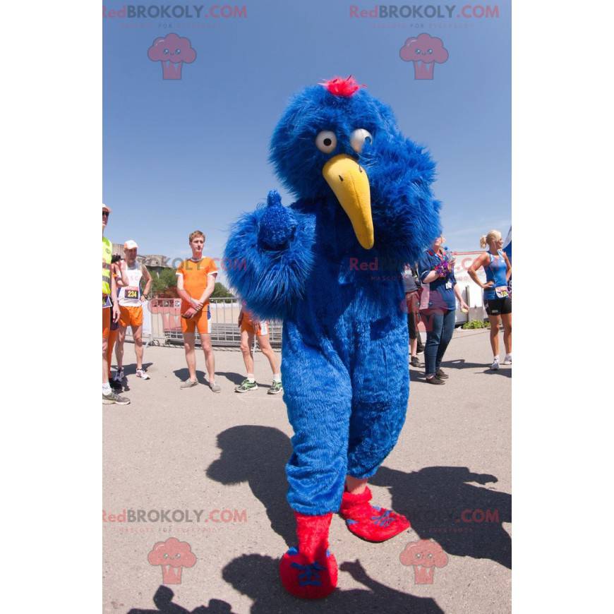 Mascotte drôle d'oiseau bleu avec un long bec jaune -