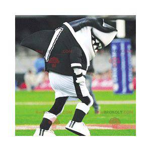Mascotte de requin noir et blanc en tenue de sport -