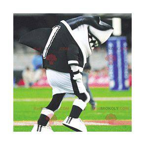 Mascotte de requin noir et blanc en tenue de sport -