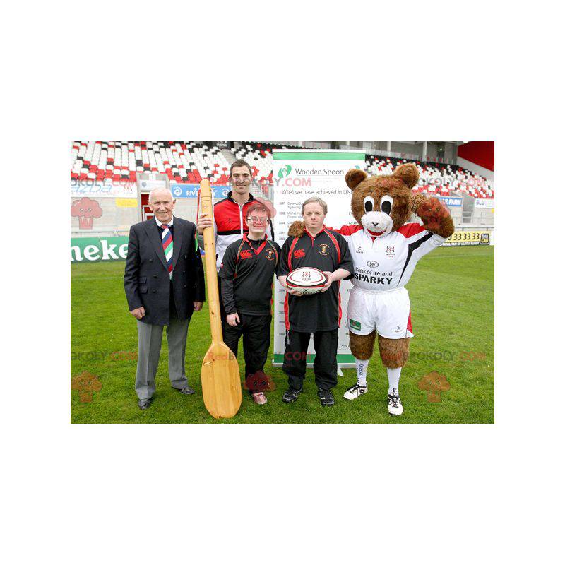 Brun og hvid bamse maskot med sportstøj - Redbrokoly.com
