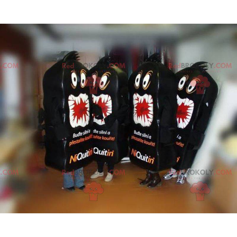 4 mascotes Niquitin. 4 mascotes de monstros negros -
