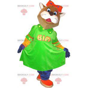 Mascotte de chat marron et blanc avec une robe verte -