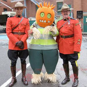 Scarecrow mascot with a pumpkin head - Redbrokoly.com