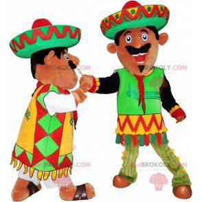 2 Mexican mascots dressed in traditional outfits -