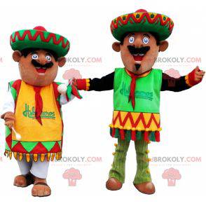 2 Mexican mascots dressed in traditional outfits -