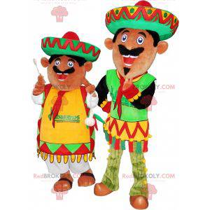 2 Mexican mascots dressed in traditional outfits -