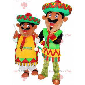 2 mexikanische Maskottchen in traditionellen Outfits -