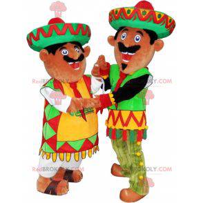 2 Mexican mascots dressed in traditional outfits -