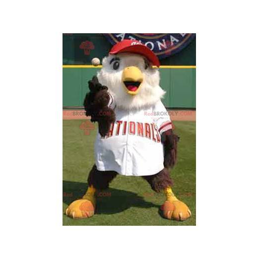 Mascotte grote bruine en witte vogel in honkbal-outfit -