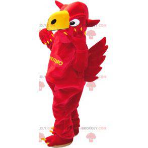 Mascot red and yellow griffin with wings in the back -
