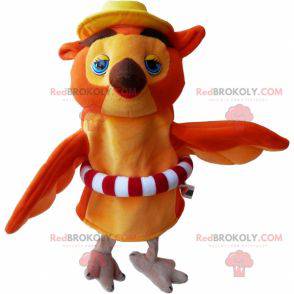 Orange und beige Eulenmaskottchen mit einer Boje -