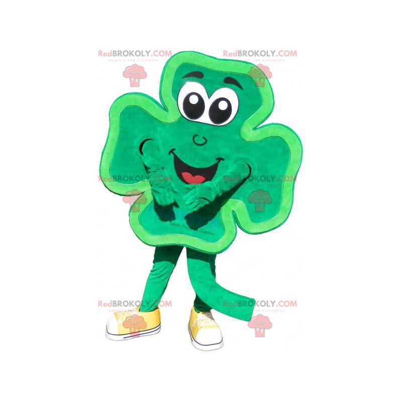 Mascotte de trèfle à 4 feuilles vert et souriant -