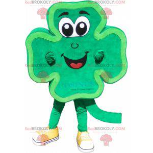 Mascotte de trèfle à 4 feuilles vert et souriant -