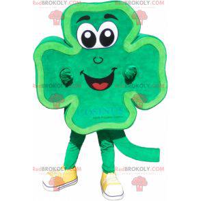 Groene en glimlachende mascotte met klavertje 4 - Redbrokoly.com