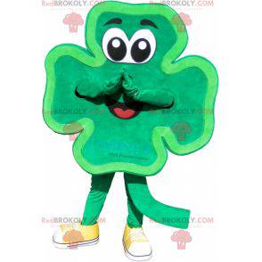 Mascotte de trèfle à 4 feuilles vert et souriant -