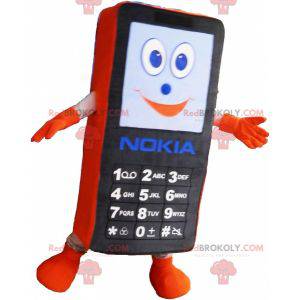 Maskotka czarny i pomarańczowy telefon komórkowy. Maskotka GSM