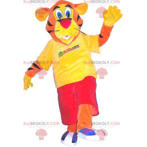 Mascota tigre naranja vestida de rojo y amarillo -