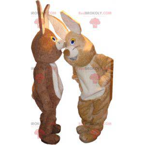 2 mascotes coelhos, um marrom e outro bege - Redbrokoly.com
