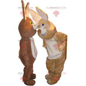 2 Kaninchenmaskottchen, eines braun und das andere beige -