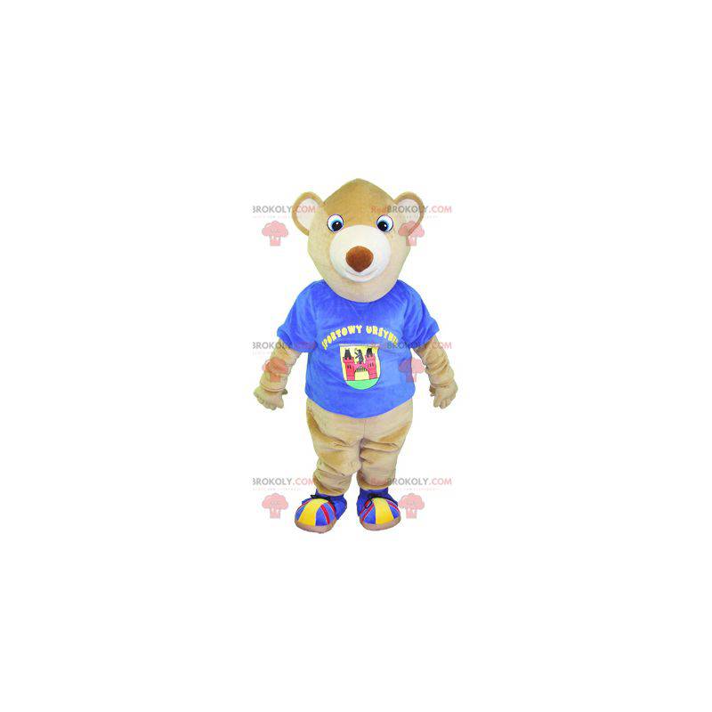 Beige teddy bear mascot with a blue t-shirt - Redbrokoly.com