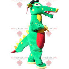 Green, yellow and red crocodile mascot with a black hat -