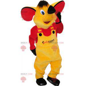 Mascote elefante amarelo com roupa amarela e vermelha -