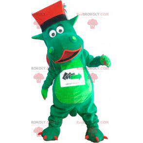 Mascotte de dinosaure géant vert avec un chapeau -