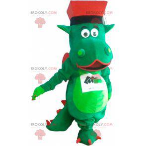 Mascotte de dinosaure géant vert avec un chapeau -