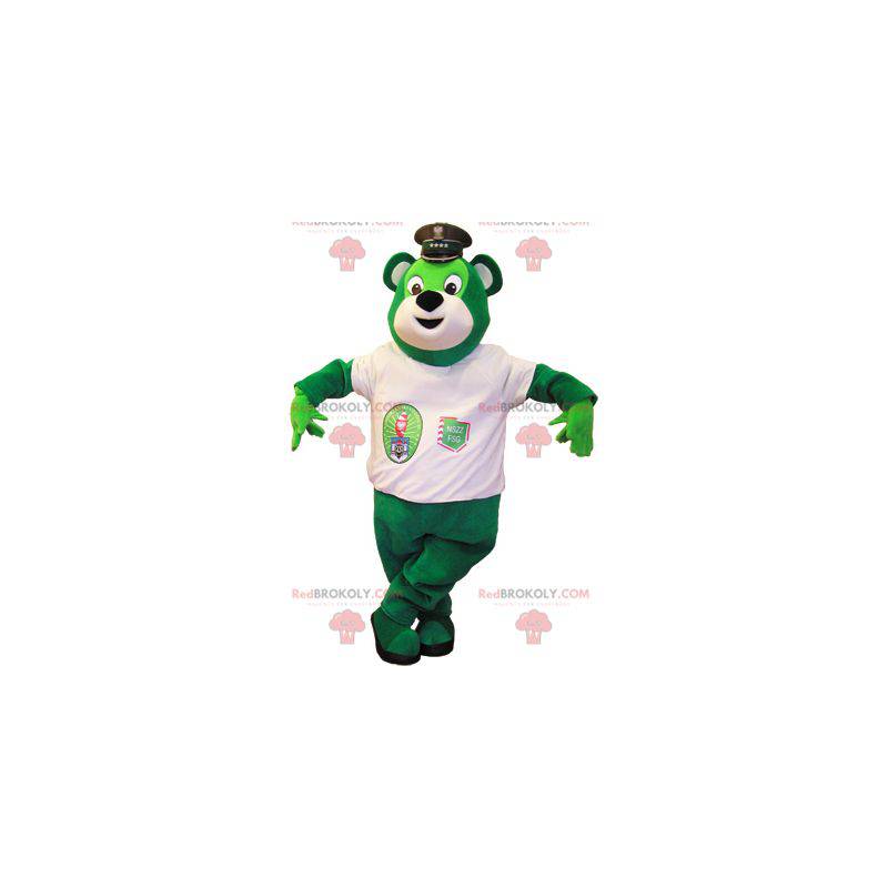 Mascota del oso de peluche verde con una camiseta blanca -