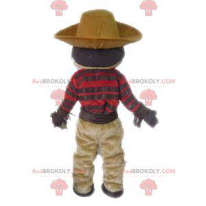 Mascotte de cow-boy moustachu en tenue traditionnelle -