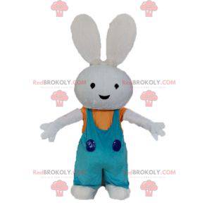Mascote coelhinho de pelúcia com macacão - Redbrokoly.com