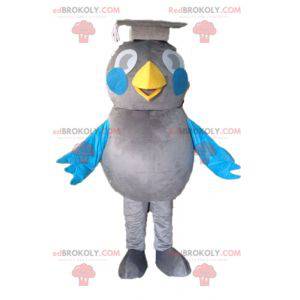 Grå och blå fågelmaskot. Graduate maskot - Redbrokoly.com
